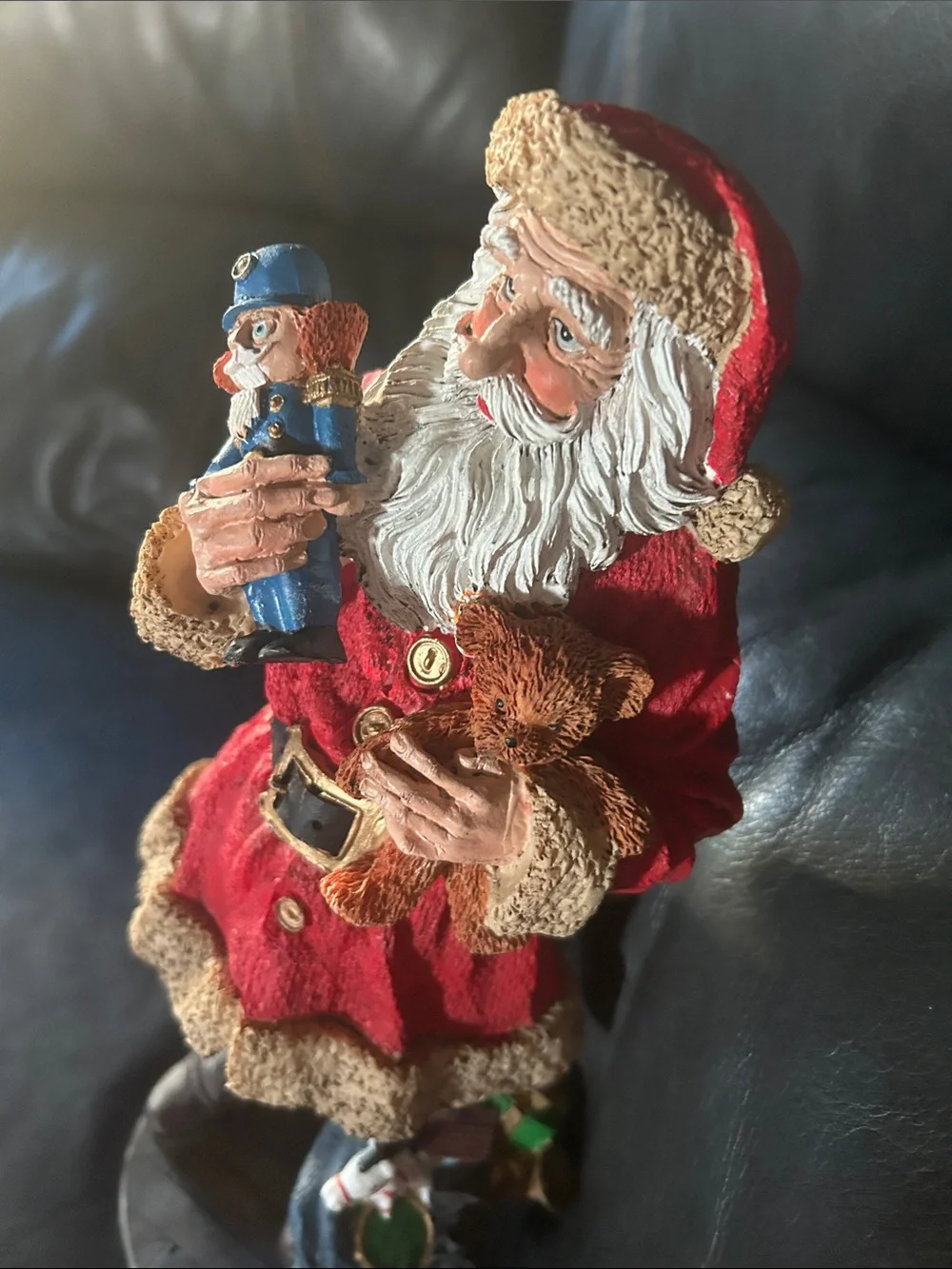 Vintage old, looking Red and Cream Santa Figurine Holding Nutcracker